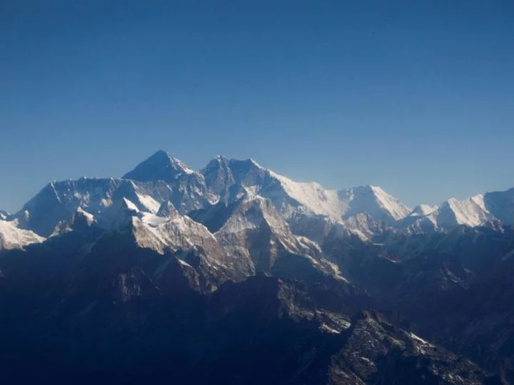 Mountaineer climbs rare Everest 'triple crown'