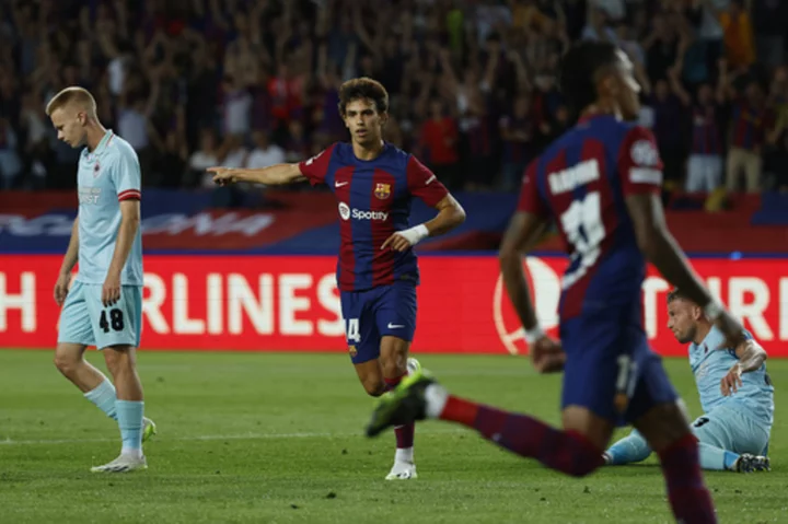 Looking to avoid another early exit, Barcelona opens Champions League with 5-0 rout of Antwerp