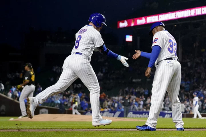 Happ's 4 RBIs lead Cubs over Pirates 11-3 after rain delay