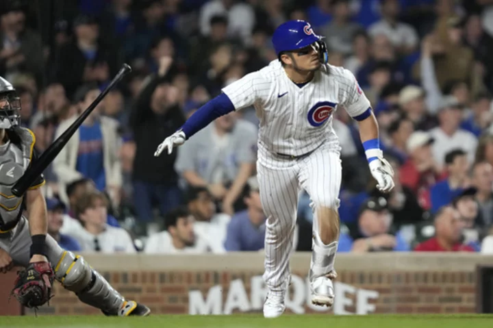 Swanson sparks 6-run 6th, Cubs rally to beat Pirates 10-6