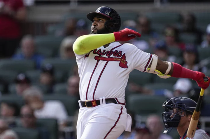 Ozuna homers twice as Braves tie HR record with 307 in 10-9 loss to Nationals