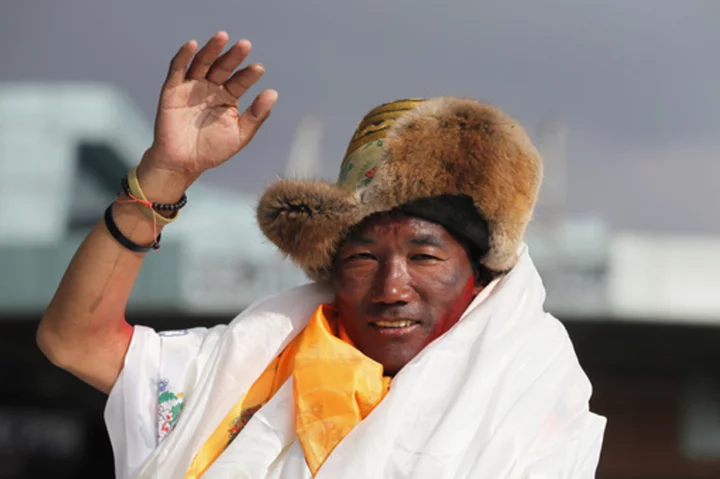 Nepal's Sherpa guide regains title for most climbs of Mount Everest after 27th trip