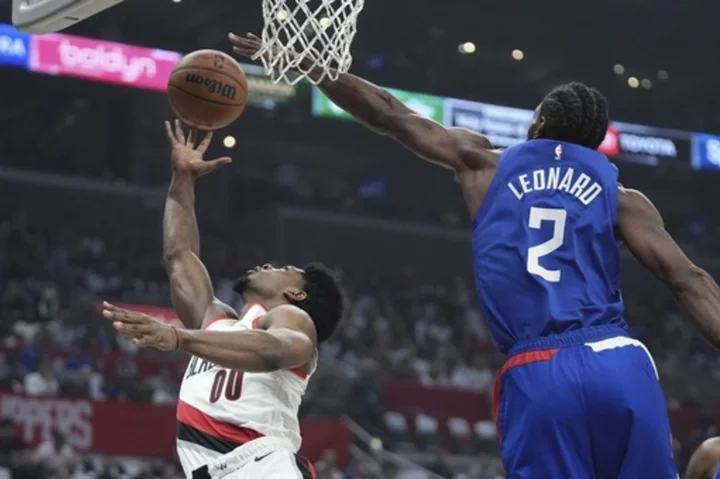 Leonard and George dominate in Clippers' 123-111 win over the Trail Blazers to open the season