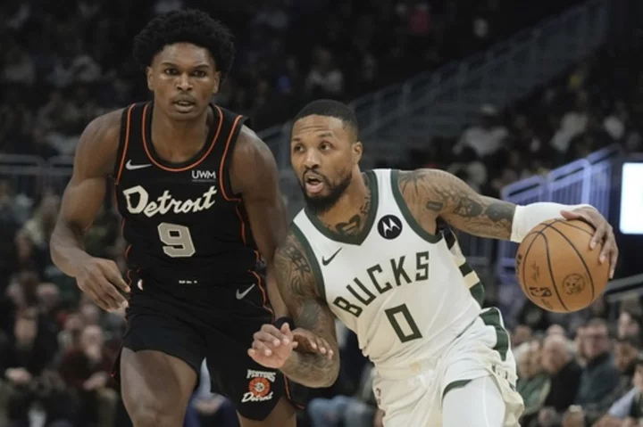 Damian Lillard scores 34 points as the Bucks beat Pistons 120-118; Giannis ejected in 3rd period