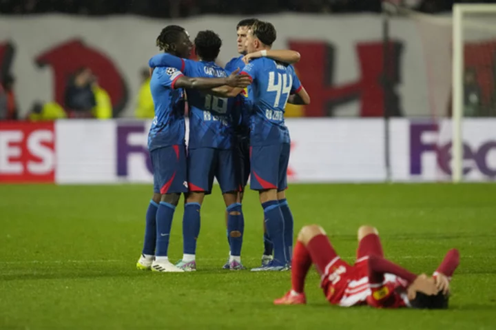 Leipzig reaches Champions League knockout stage with 2-1 win at Red Star Belgrade