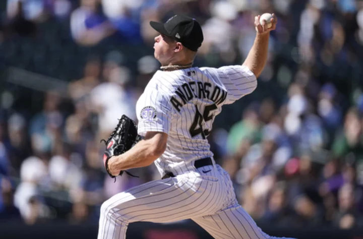 Anderson's strong outing and Jones' bat lead Rockies past Dodgers 4-1 in DH opener