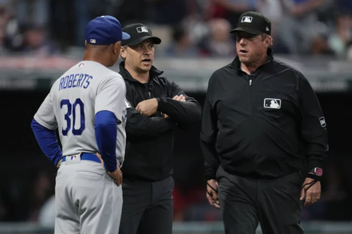 Dodgers-Guardians suspended by rain after 2 innings, set to resume Thursday with LA up 3-1