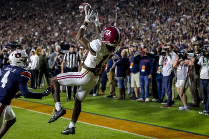 Milroe's TD pass to Bond on fourth-and-31 rescues No. 8 Alabama in 27-24 win over Auburn