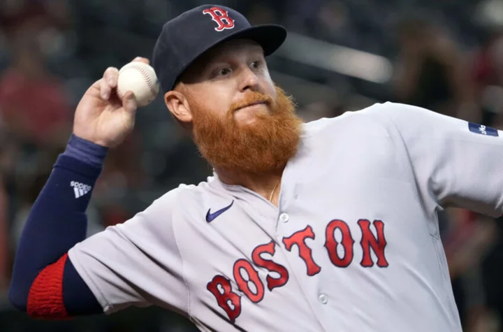 Justin Turner signed the foul ball that hit Yankees announcer John Sterling
