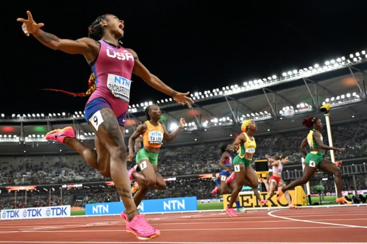 'I'm back!': Richardson takes stunning world 100m gold