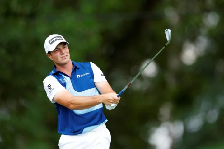 Hovland outduels Schauffele to win PGA Tour Championship