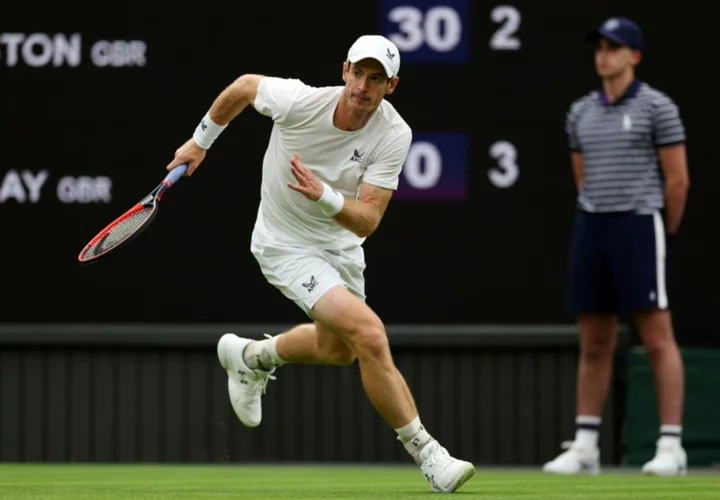 Two-time champion Murray sweeps into Wimbledon second round