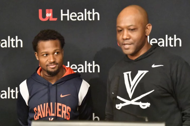 Virginia RB Perris Jones walks out of Louisville hospital after spinal surgery, rehab
