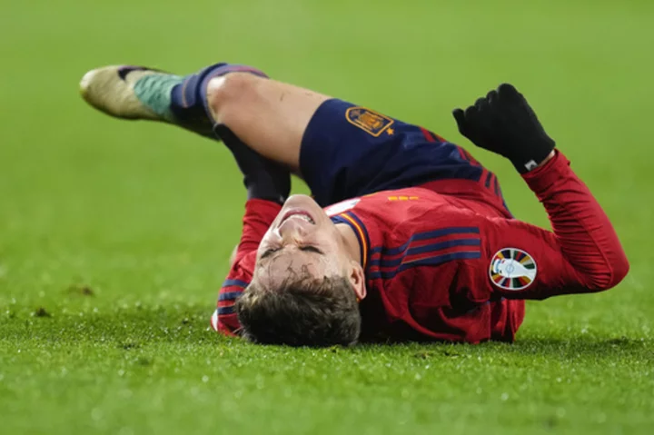 Spain midfielder Gavi leaves European qualifier in tears with apparent leg injury