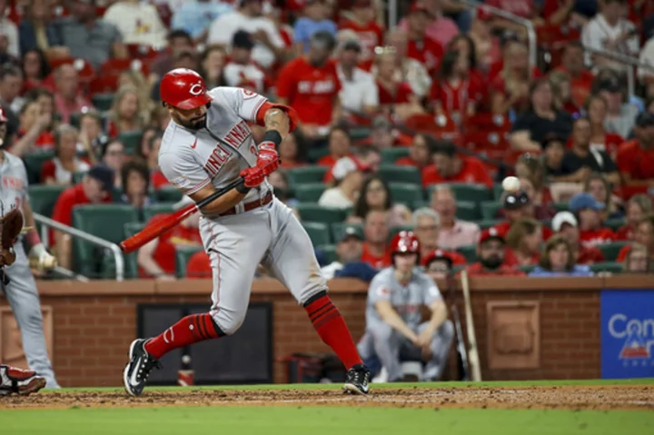 Reds hit six home runs, keep playoff hopes alive with 19-2 rout of Cardinals