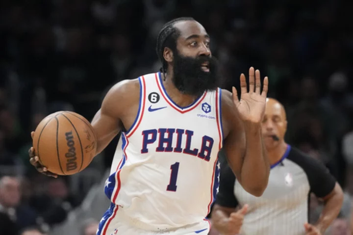 Harden picks up $35.6 million option with the 76ers, team exploring trades