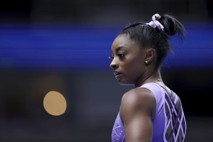 Simone Biles wows on vault while surging to the lead at the U.S. gymnastics championships