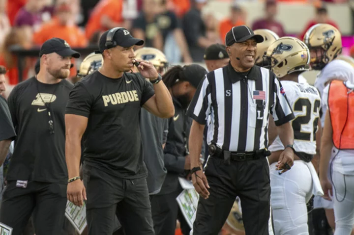 Hudson Card leads Boilermakers past Hokies 24-17 after lengthy weather delay