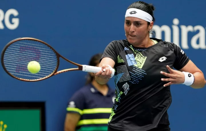 Ailing Jabeur battles into US Open second round