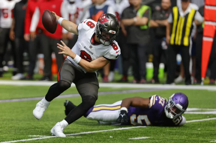 Buccaneers top Vikings 20-17 as Baker Mayfield finishes strong in his debut