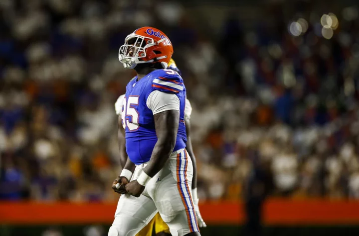 Watch: Florida defensive lineman ejected for despicably spitting at FSU player