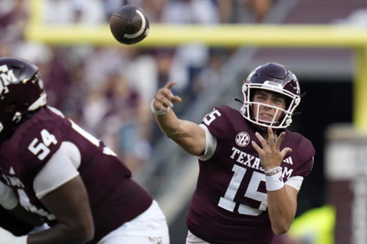 Weigman has career-best 5 TDs, No. 23 A&M rolls past New Mexico 52-10 in Petrino's debut