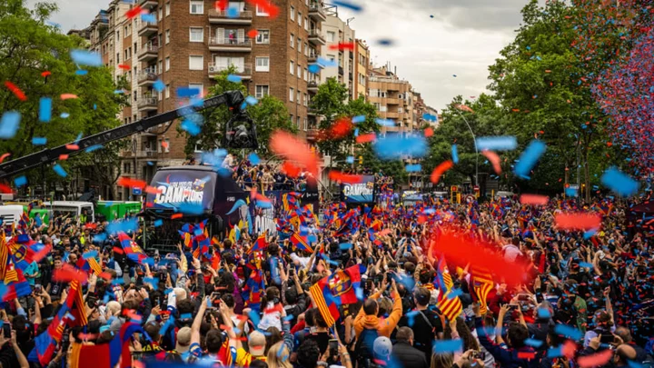 Barcelona fans pack the streets to celebrate La Liga title win