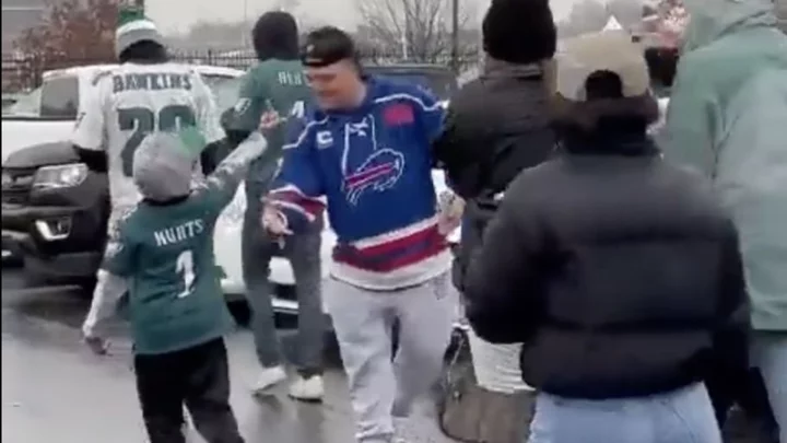 Young Eagles Fan Leaves Bills Fan Hanging, Gives Him the Finger While Adults Laugh and Film