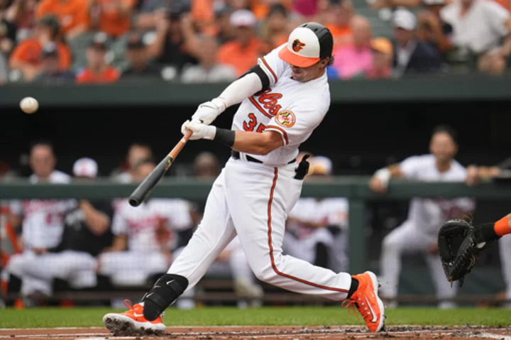 AL-leading Orioles beat Astros 5-4 and extend streak to 76 series without being swept