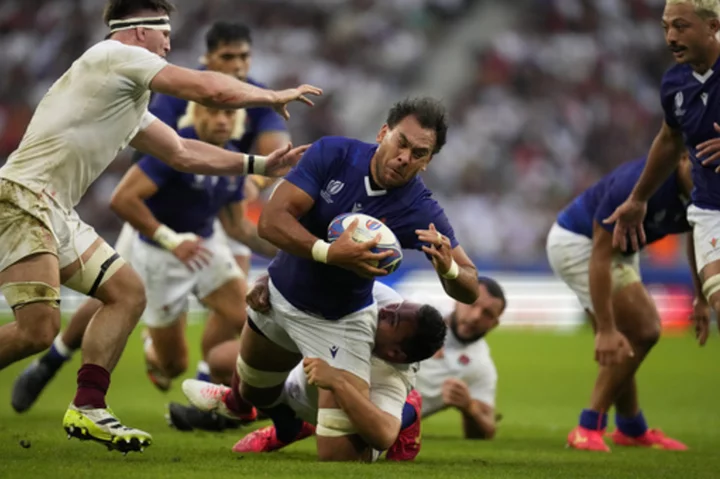 AP PHOTOS: Rugby World Cup quarterfinal lineups decided as Portugal exits in style