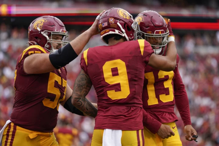 Heisman winner Caleb Williams throws 5 TD passes and No. 6 USC routs Nevada 66-14