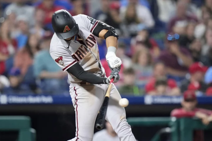 Gurriel extends majors' longest hitting streak to 15 games, D-backs beat Phillies 6-3