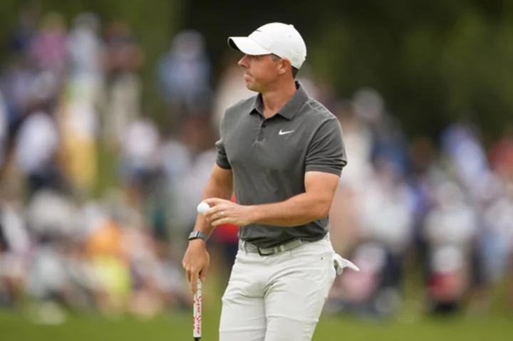 McIlroy, Koepka shake hands and smile, then turn to chasing down leaders at US Open