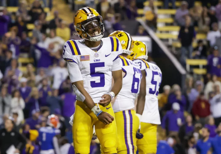 Daniels' record-breaking day leads No. 18 LSU to 52-35 win over Florida