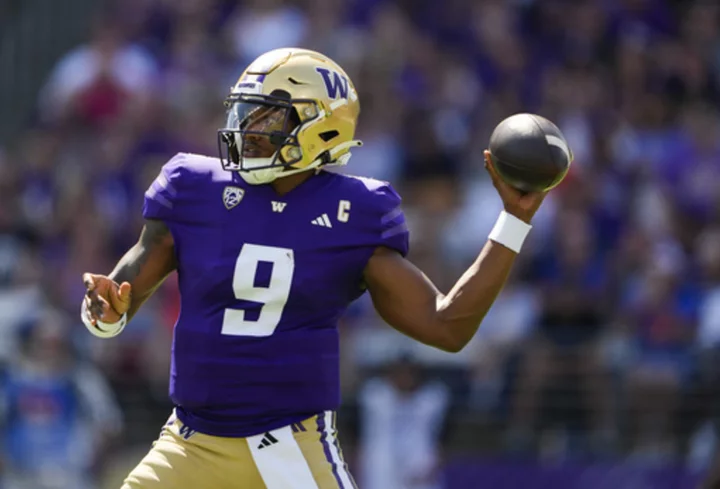 Michael Penix Jr. throw for 5 TDs as No. 10 Washington overwhelms Boise State 56-19