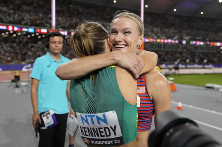Finishing tied, Katie Moon and Nina Kennedy decide to split the pole vault gold at worlds
