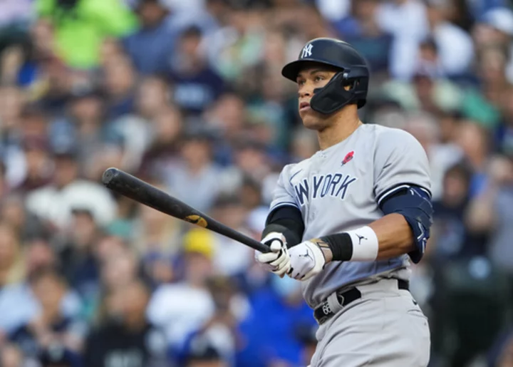 Judge's 2 HRs help Germán win after suspension, Yankees top Mariners 10-4