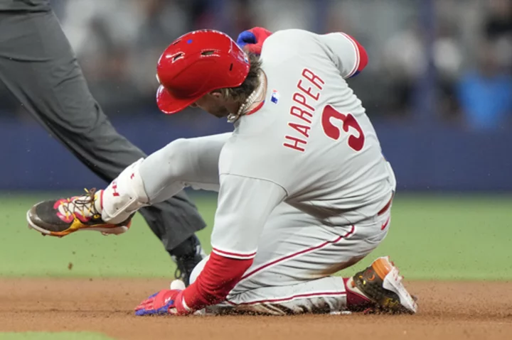 Phillies' Bryce Harper hit on surgically repaired elbow by pitch, leaves game