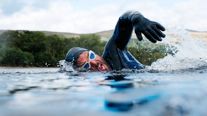Ross Edgley ends longest non-stop lake swim in heatwave