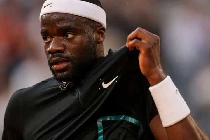 Tiafoe claims maiden grass court title and moves into top 10