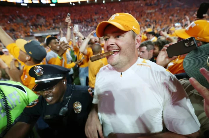Why do Alabama and Tennessee players smoke cigars after winning rivalry game?