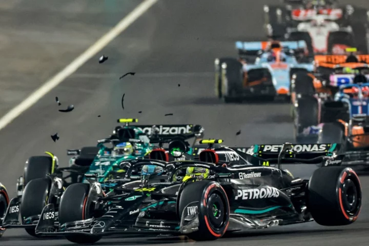 Hamilton takes blame for crash with team-mate Russell