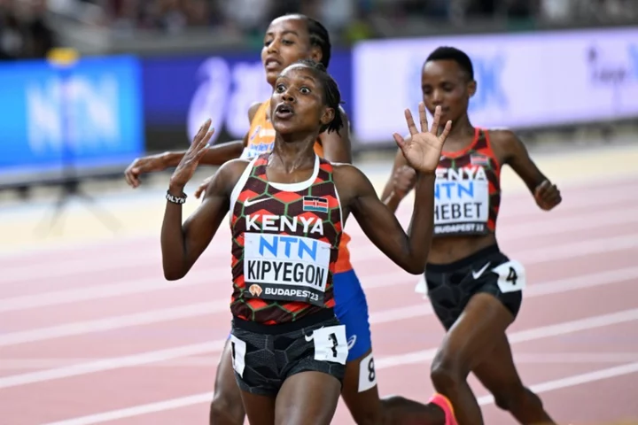 Kenya's Faith Kipyegon wins world 5,000m for historic double