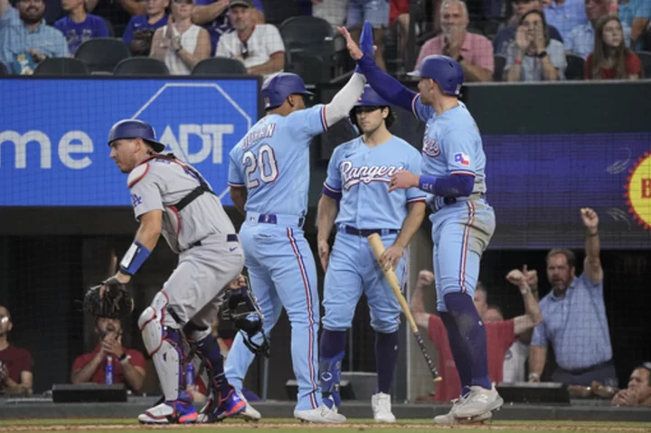 Rangers beat Dodgers 8-4 to avoid sweep; LA's Muncy hits grand slam