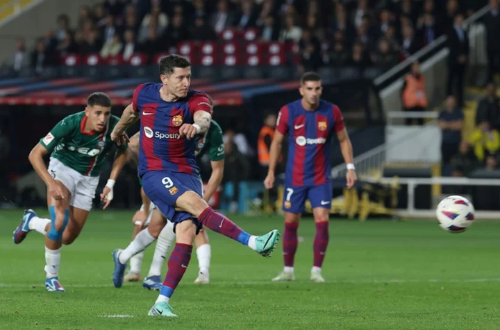 Lewandowski double rescues Barca against Alaves, Sevilla hold Betis