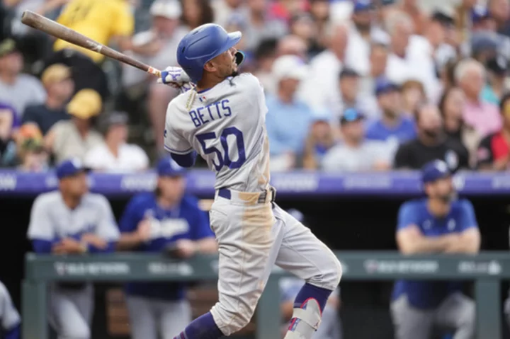 Tovar hits 3-run double to spark the Rockies past the Dodgers, 9-8