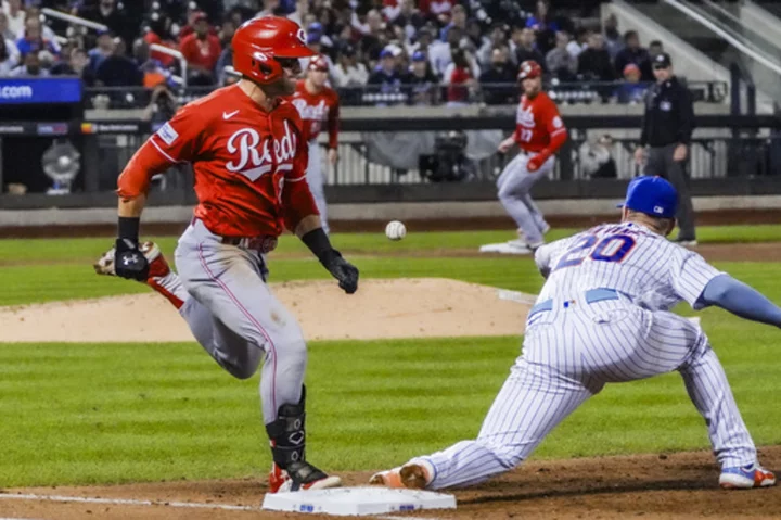 Encarnacion-Strand's 2-run homer lifts the Reds over the Mets 3-2