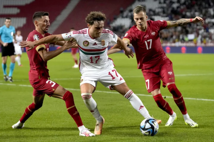 Hungary remains unbeaten after 2-1 win at Serbia in European Championship qualifying