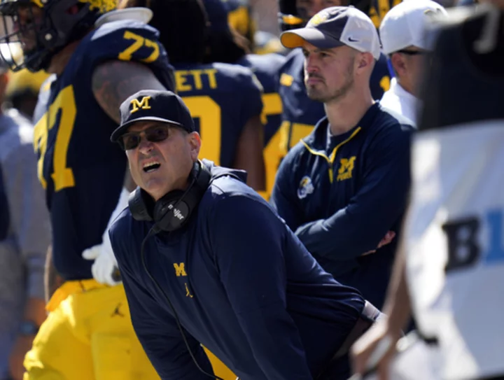 Michigan responds to Big Ten, saying commissioner doesn't have discipline authority, AP source says