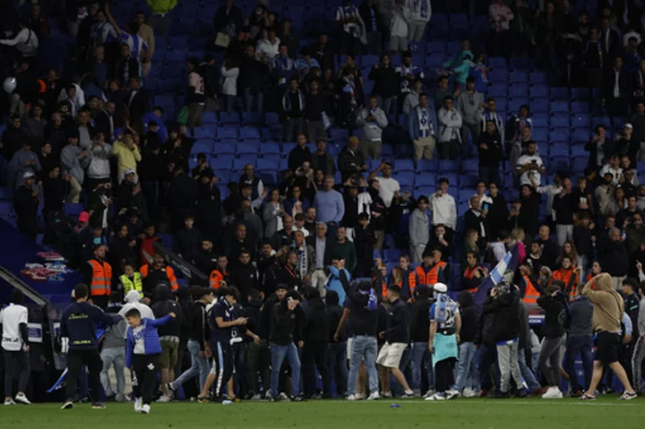 Spanish league and Espanyol trying to identify field invaders after Barcelona's title win